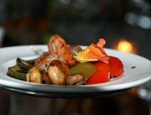 shrimp with mushroom served on white ceramic plate thumbnail