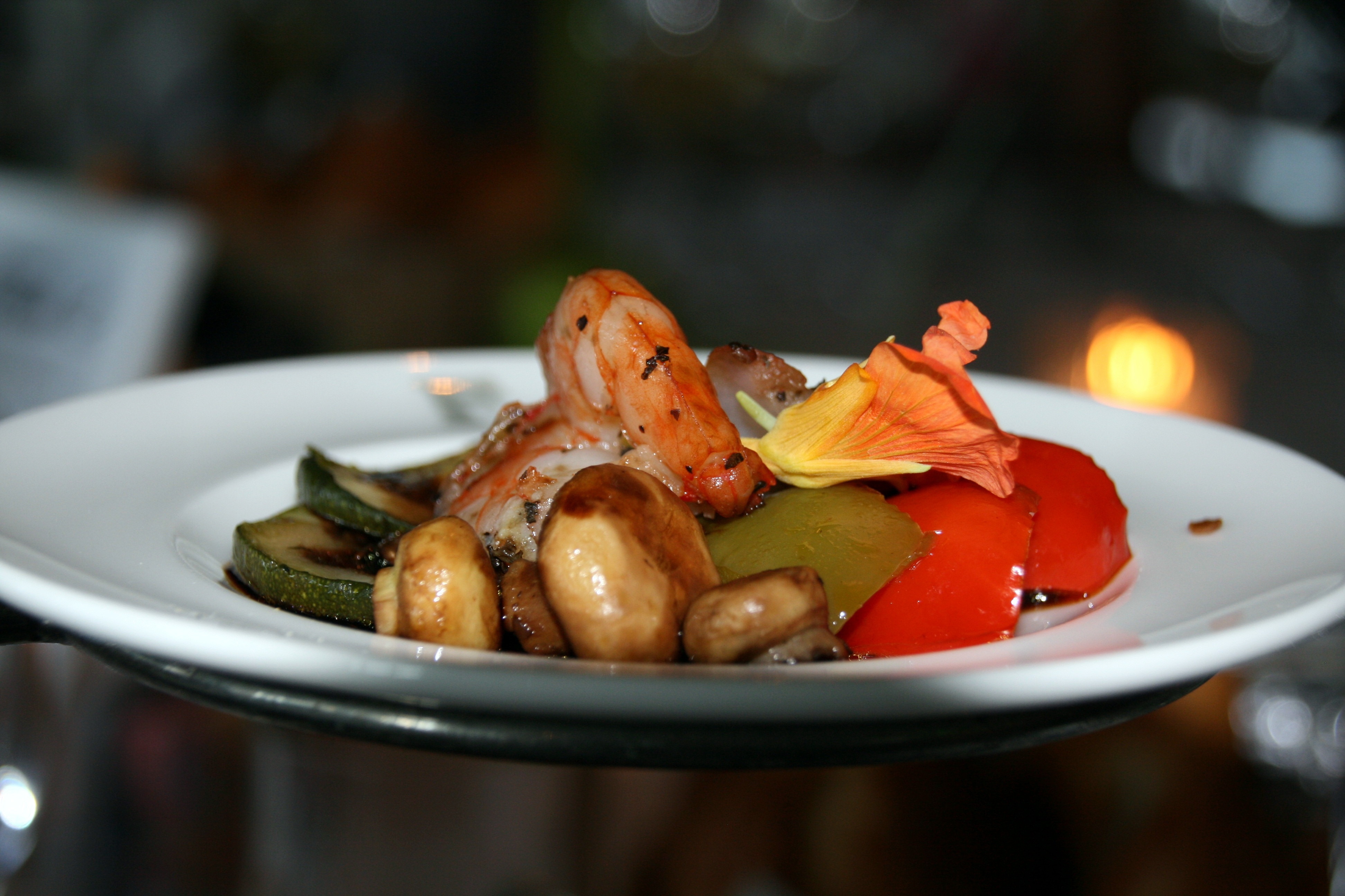 shrimp with mushroom served on white ceramic plate