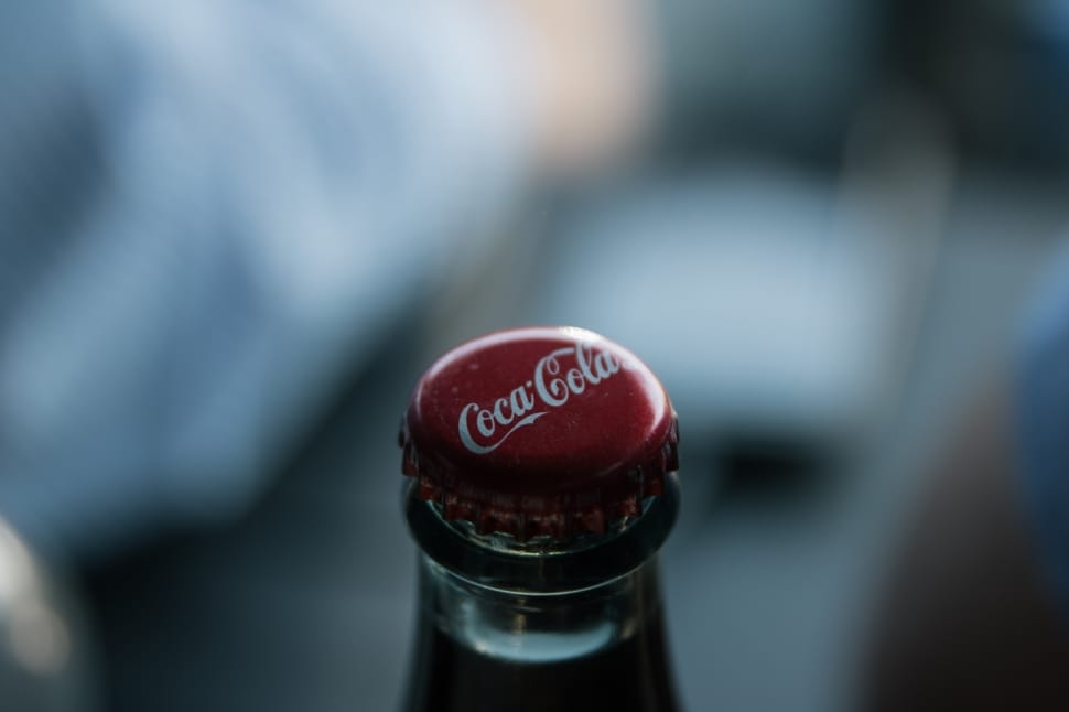 selective focus photography of coca cola bottle crown preview