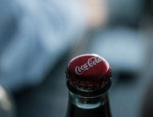selective focus photography of coca cola bottle crown thumbnail