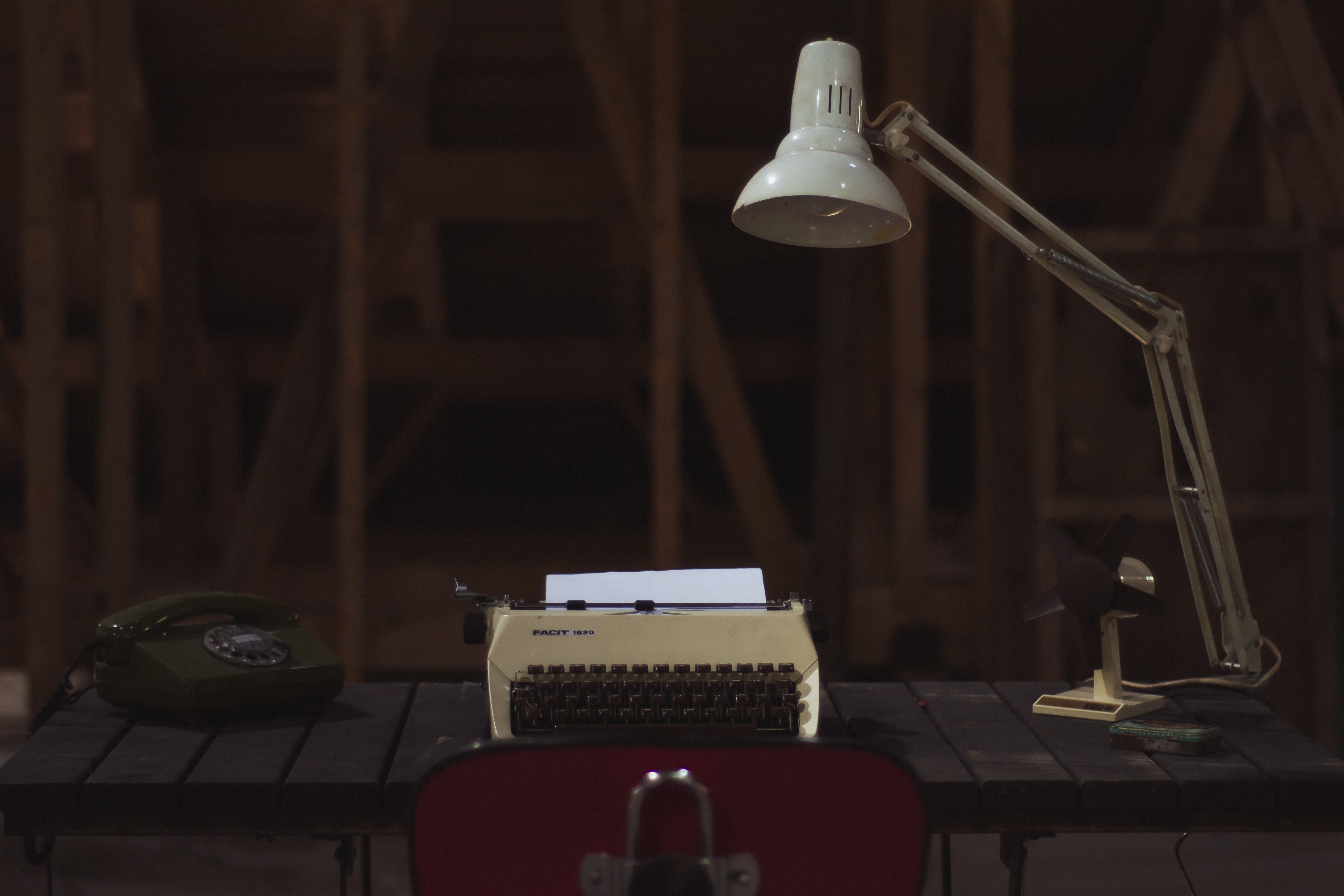study lamp near typewriter on top table