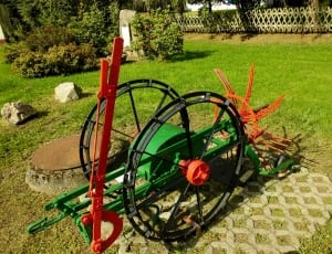 black red and green steel garden equipment thumbnail