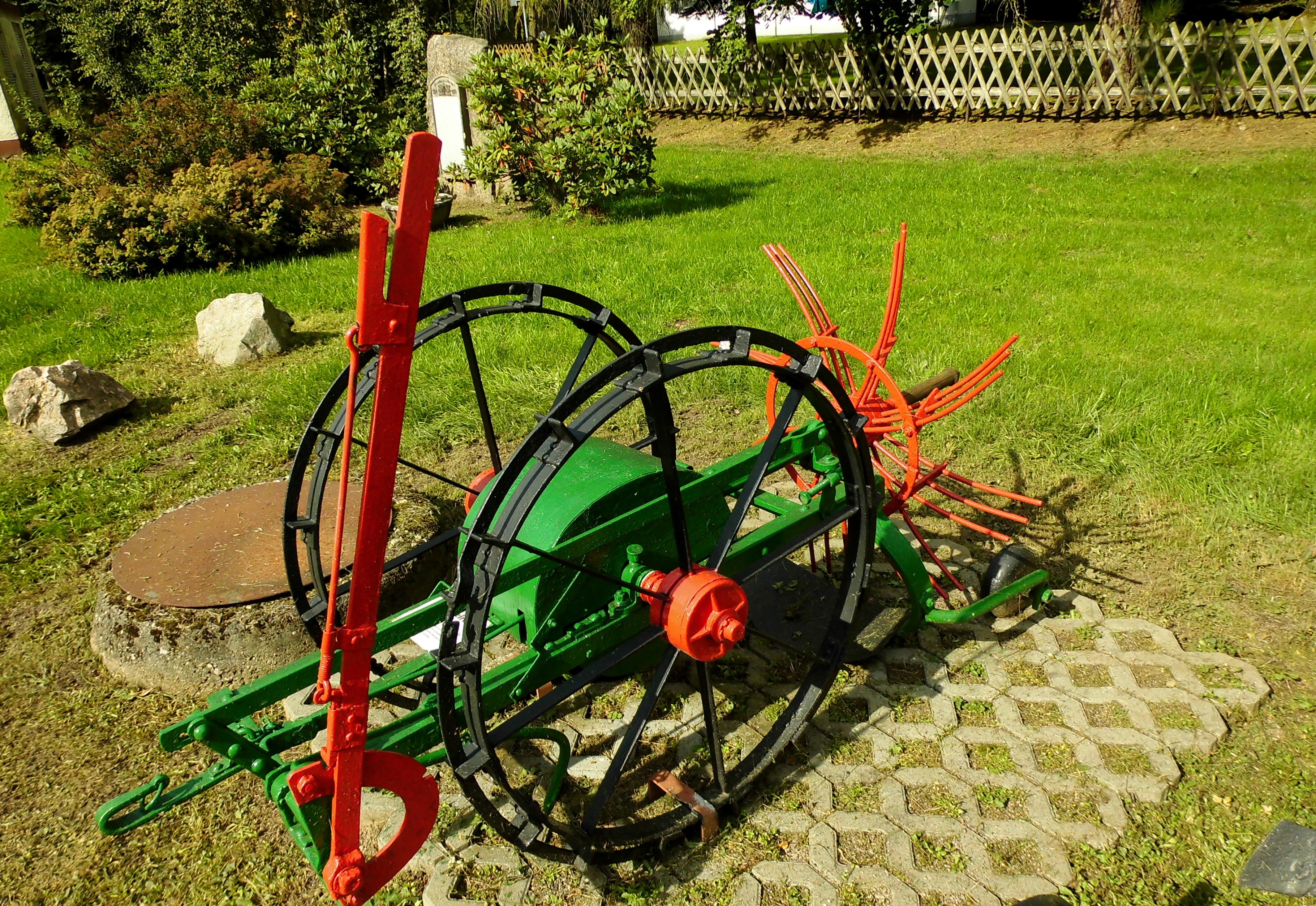 black red and green steel garden equipment