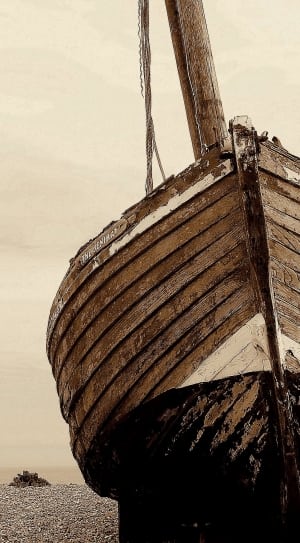 brown and black wooden ship thumbnail