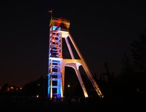 white watch tower during night thumbnail