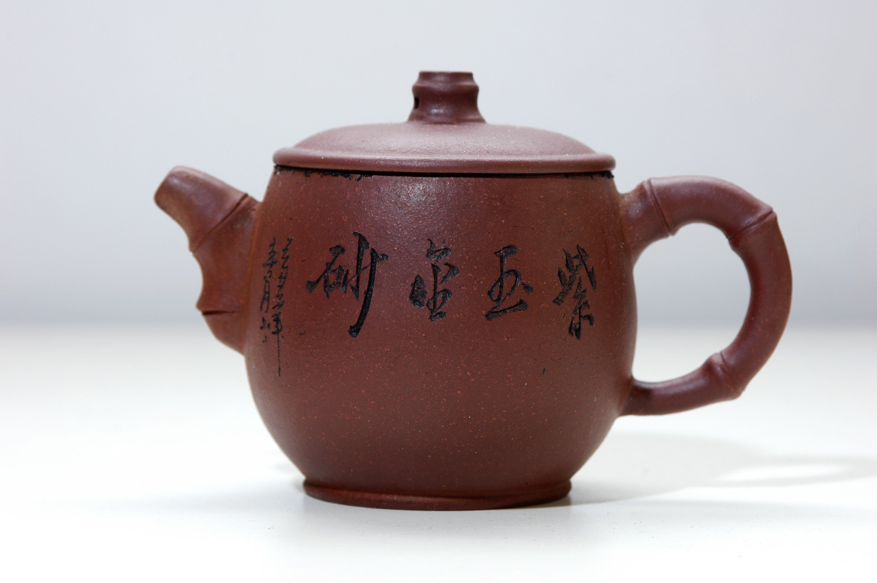 brown ceramic teapot