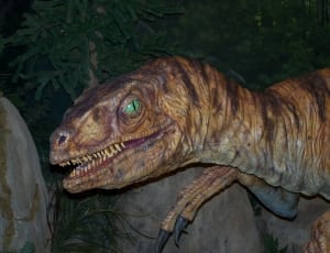 brown dinosaur statue thumbnail