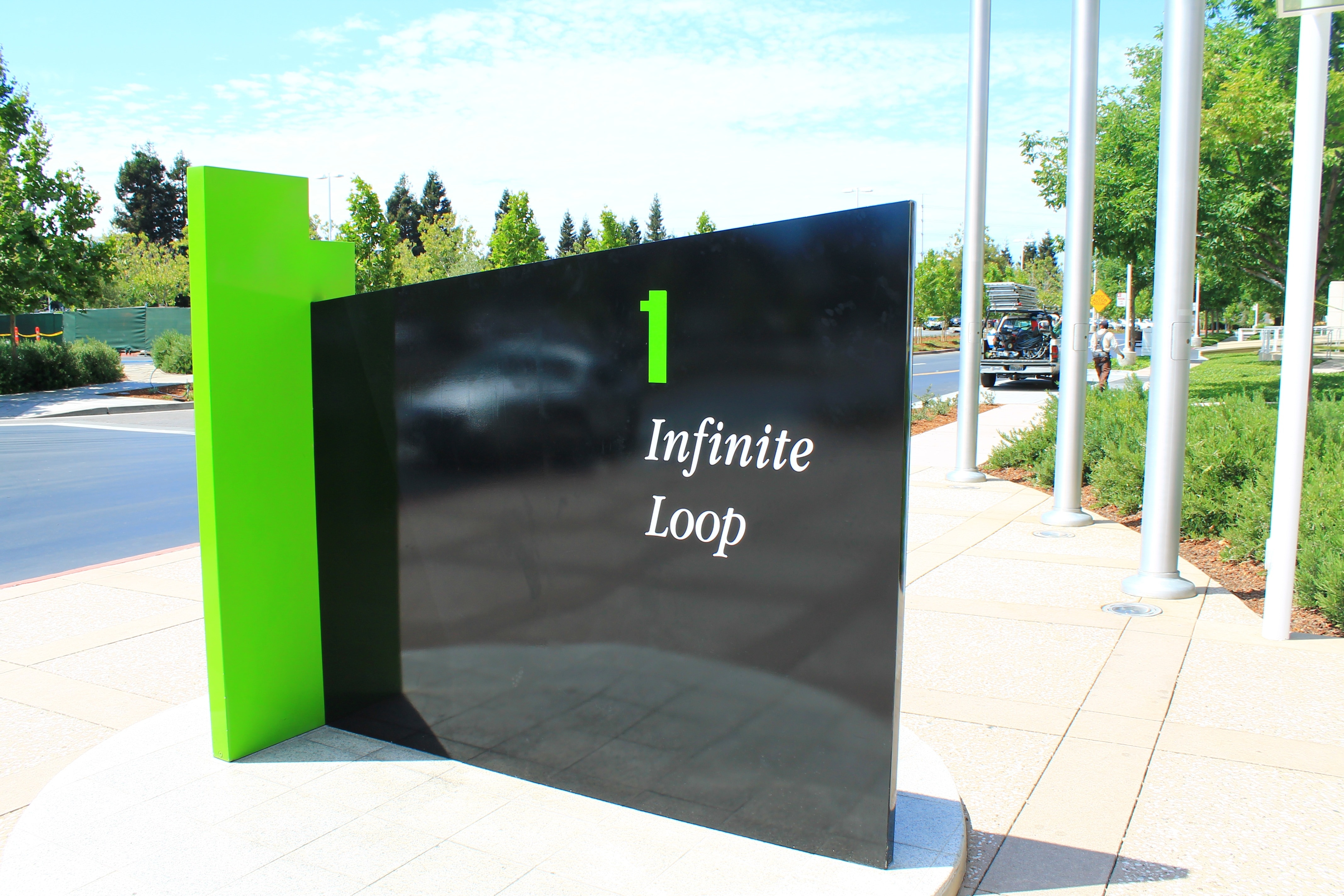 black and green infinite loop signage