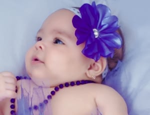 baby's purple flower accent headband thumbnail