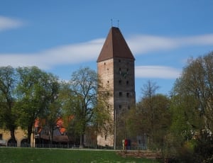 white brick and brown roofed tower thumbnail