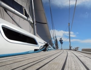 white and blue sail boat thumbnail