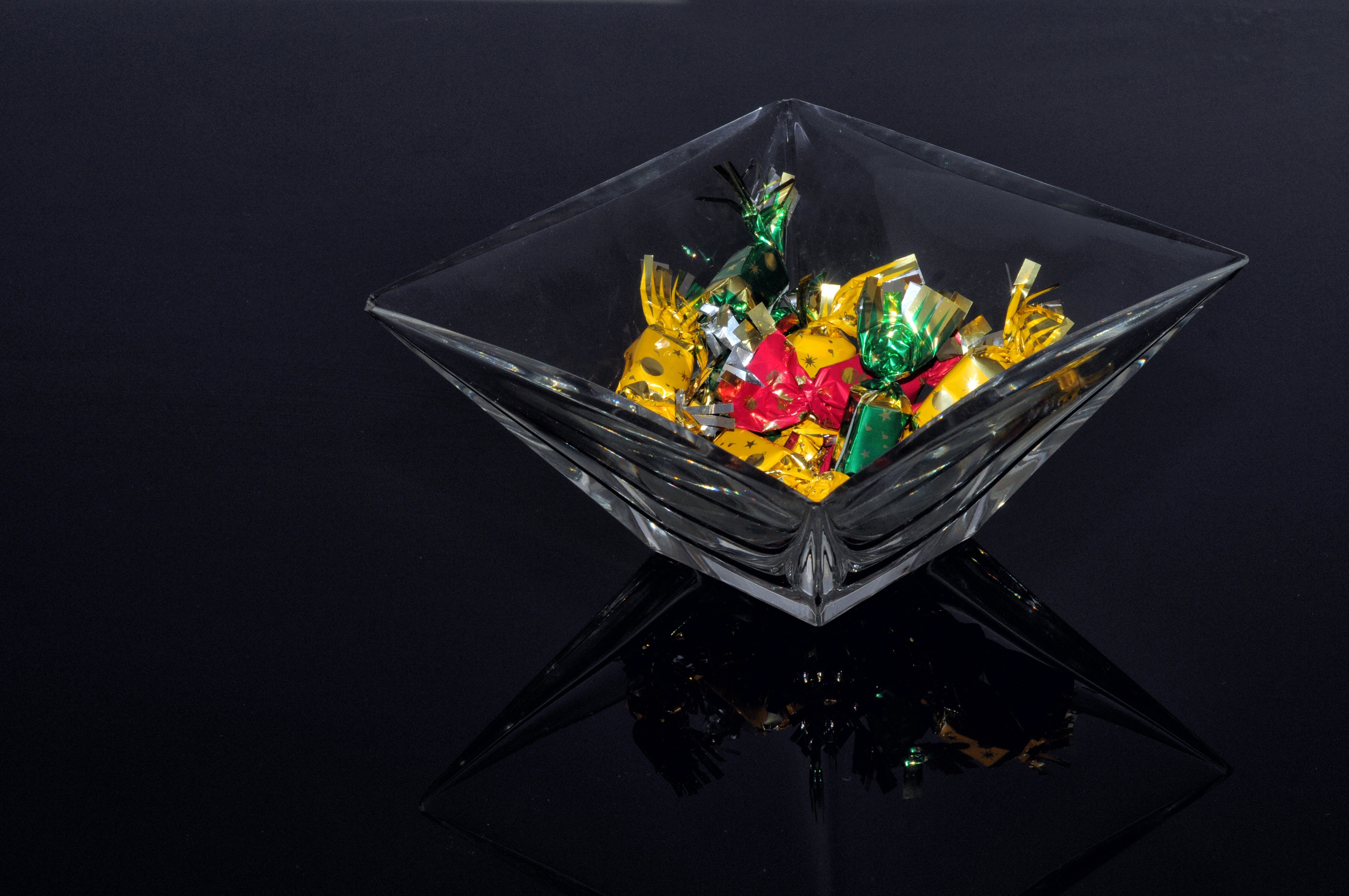 assorted candies on glass bowl