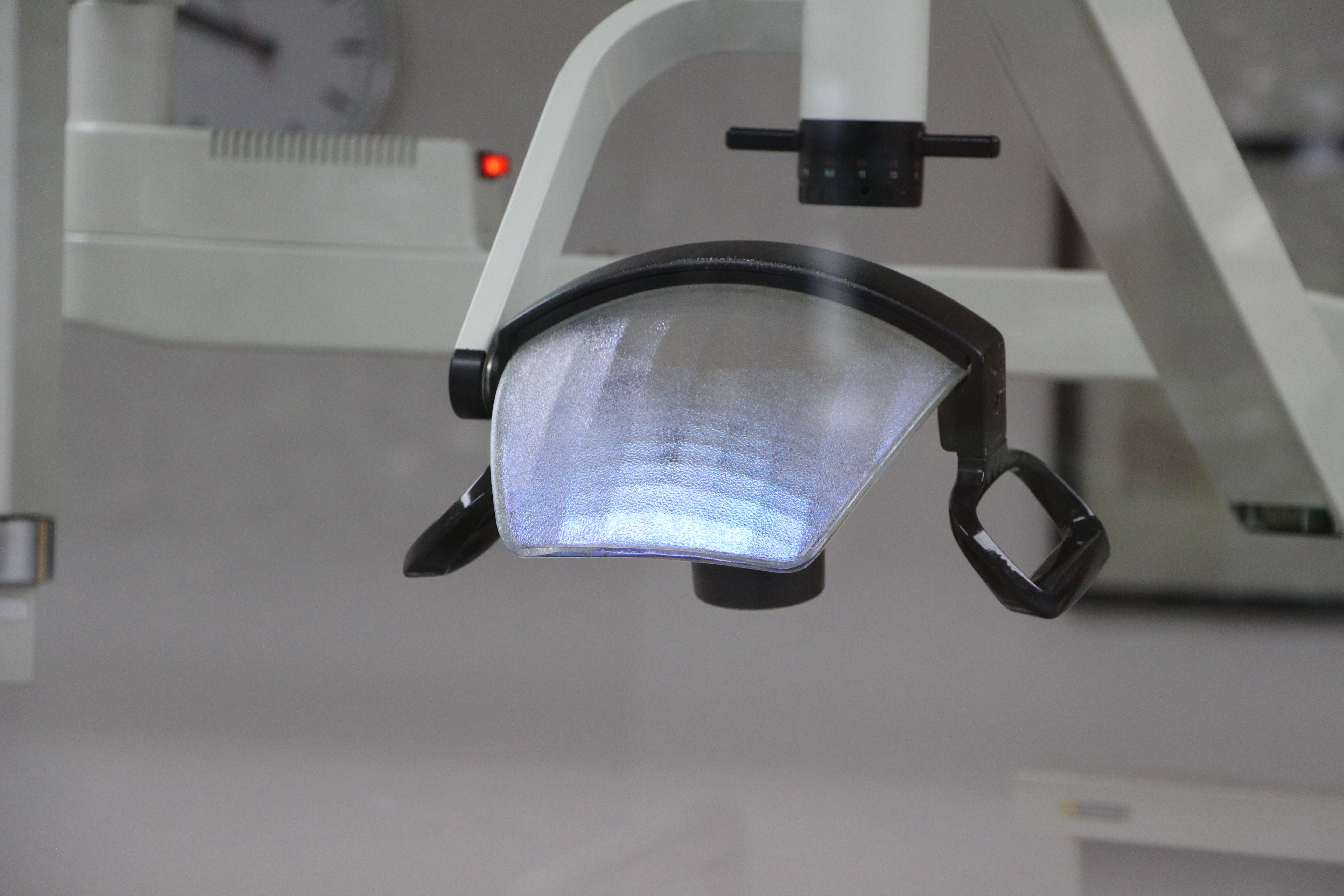 black and gray dental unit head lamp