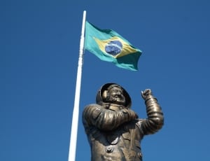 astrounaut statue and brazil flag thumbnail