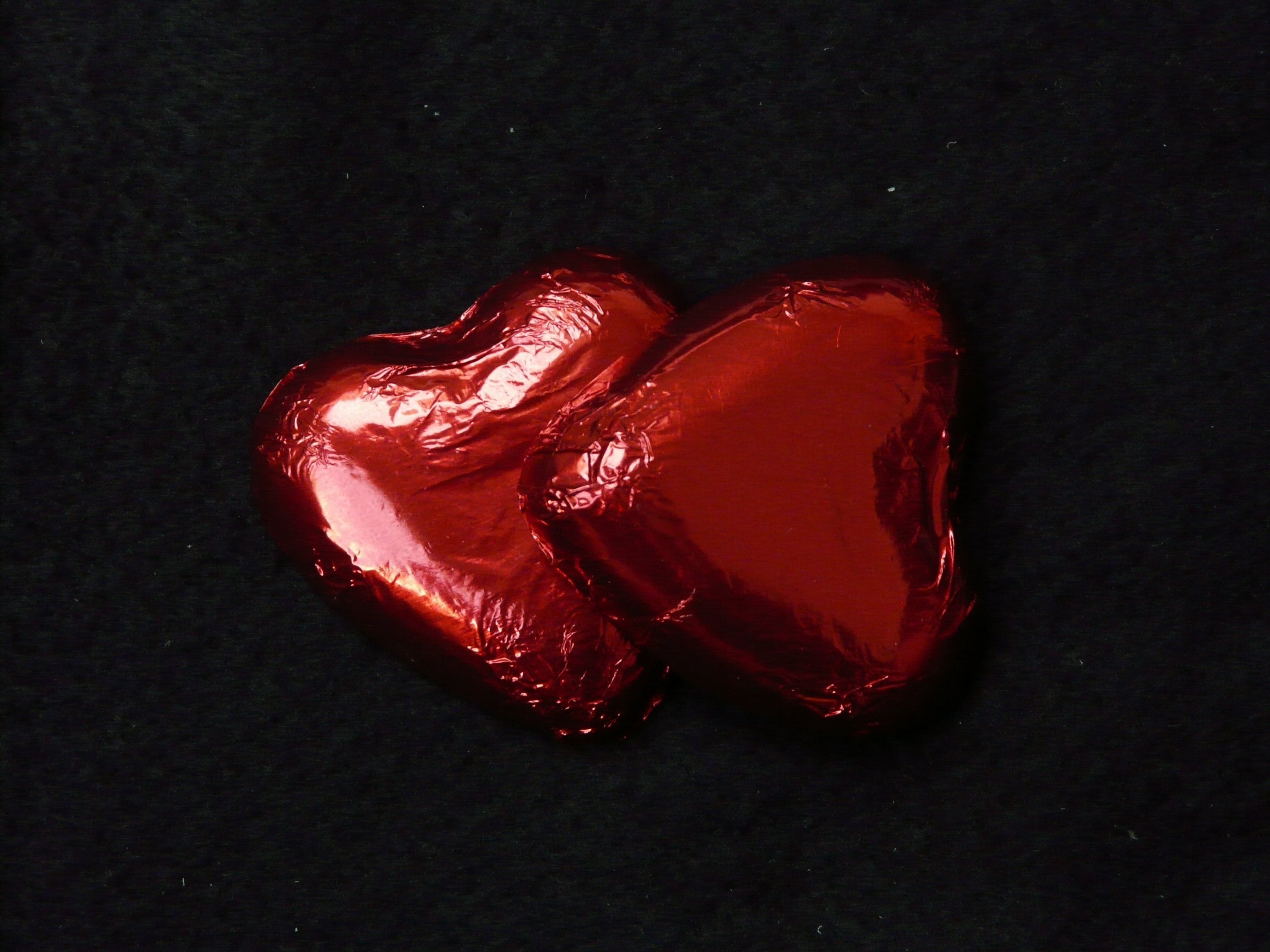 2 heart shaped plastic packs
