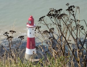 white and red light house thumbnail