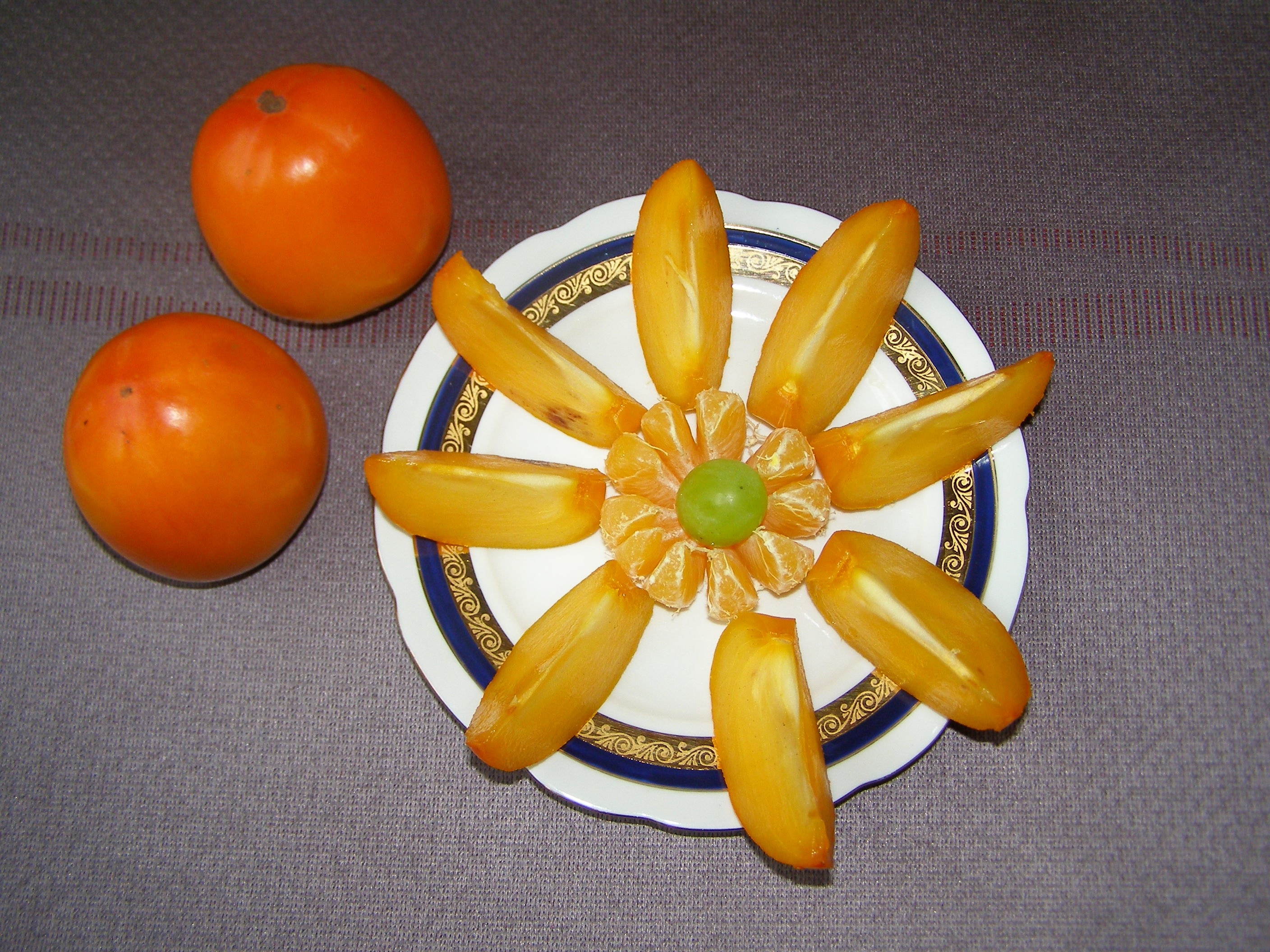 two orange round fruits