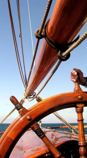 brown wooden sailor's wheel thumbnail