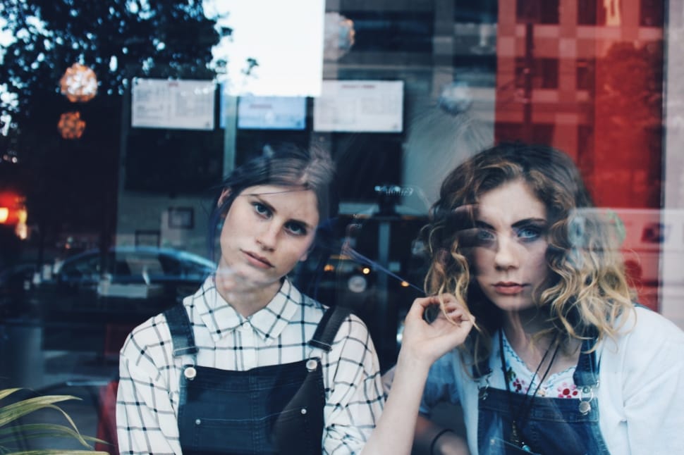 two women wearing dungarees preview