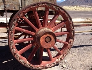 red wooden carriage wheel thumbnail
