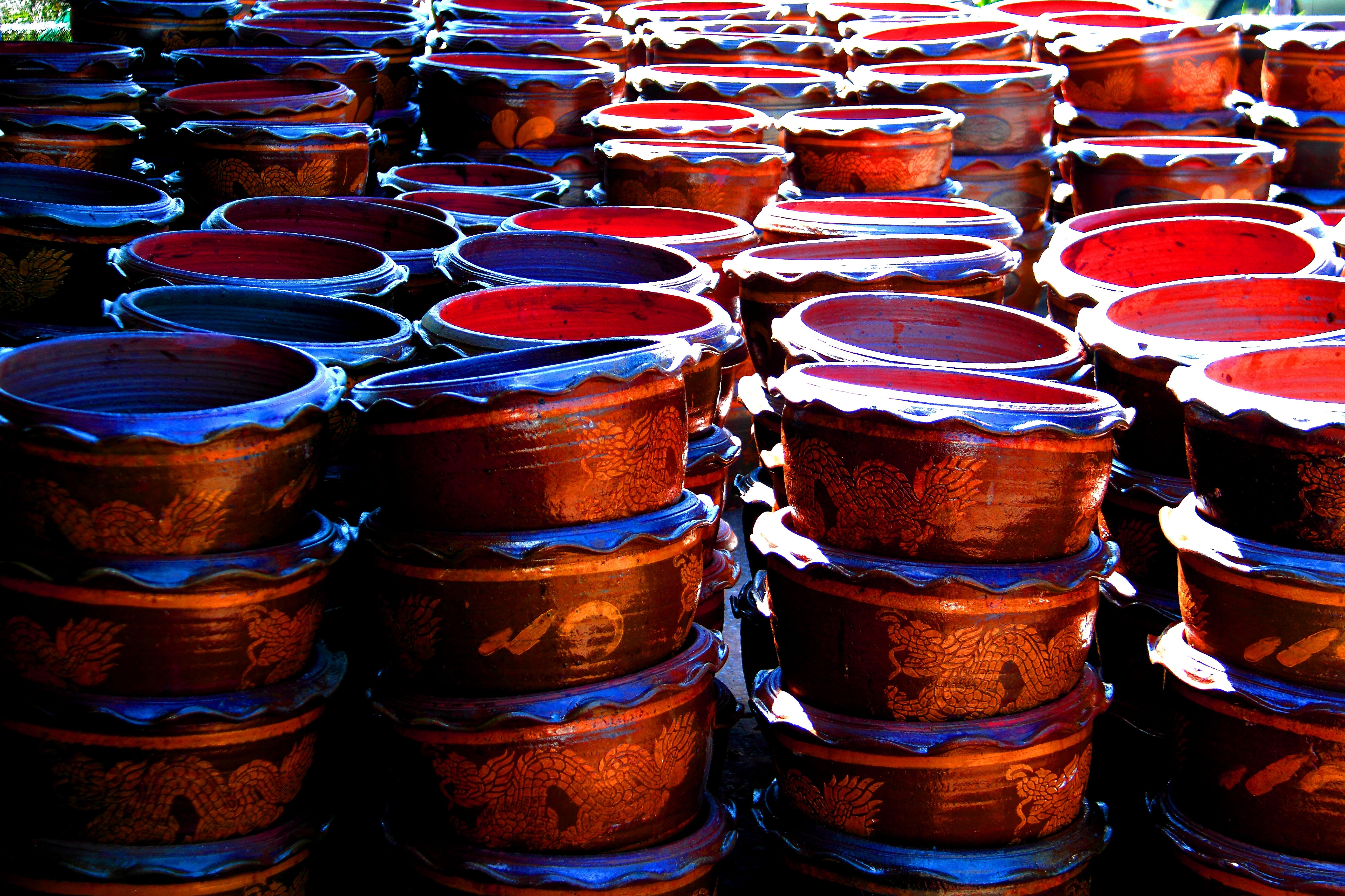 piled brown wooden bowls