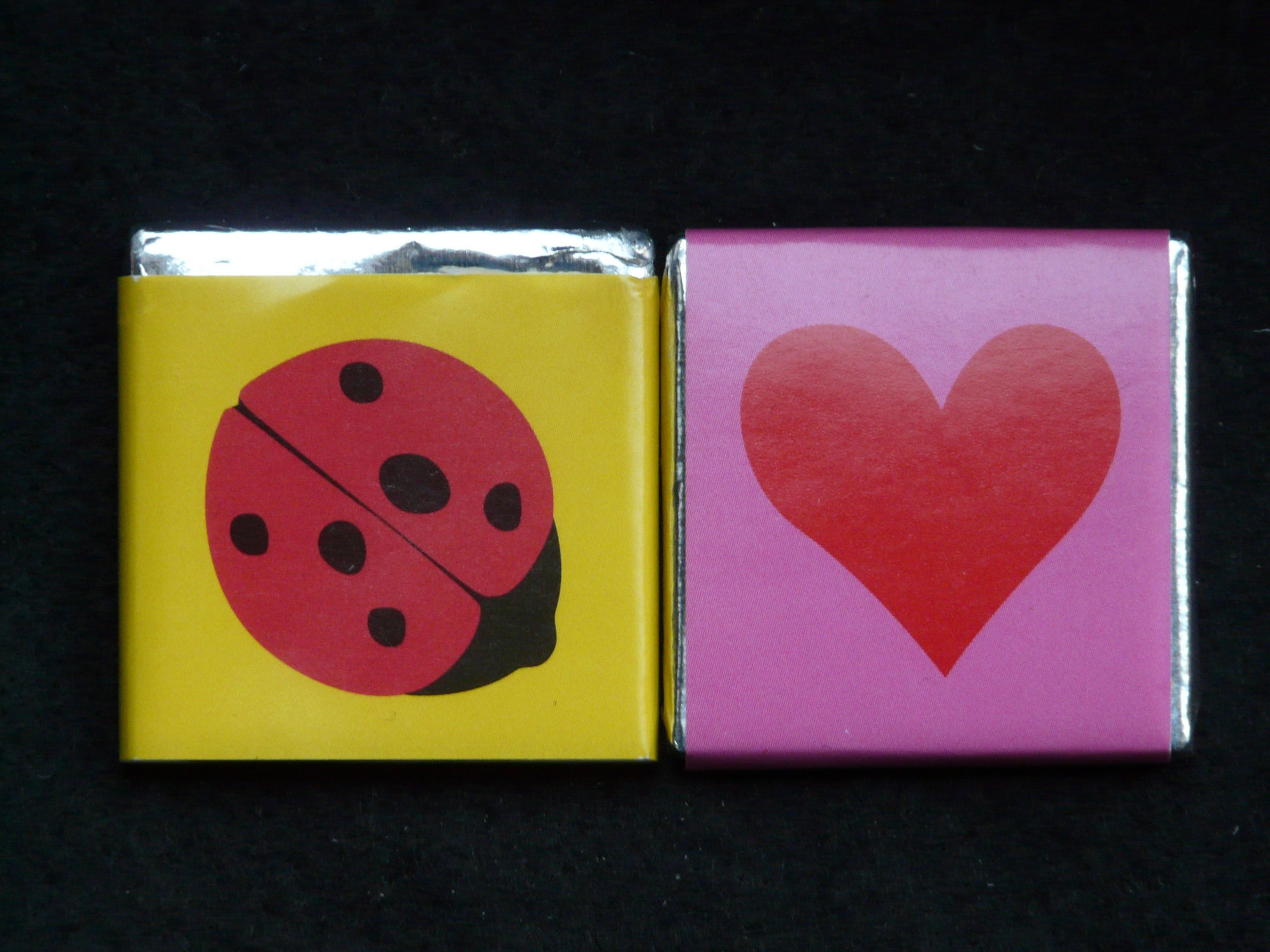yellow pink and red ladybug and heart decor
