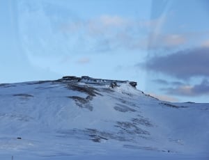 white snowy mountain during daytime thumbnail