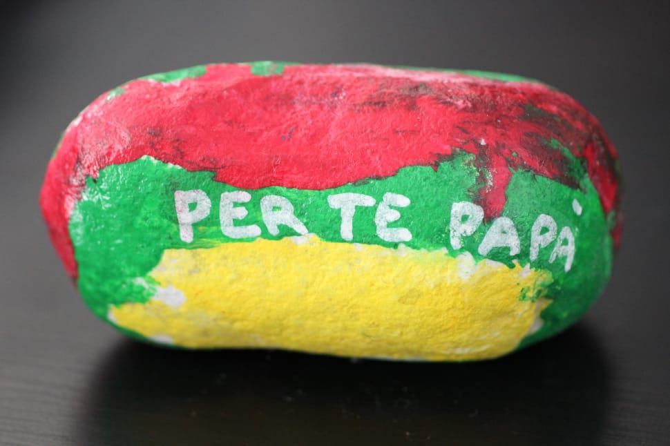 red green and yellow perte papa decorative oval stone preview
