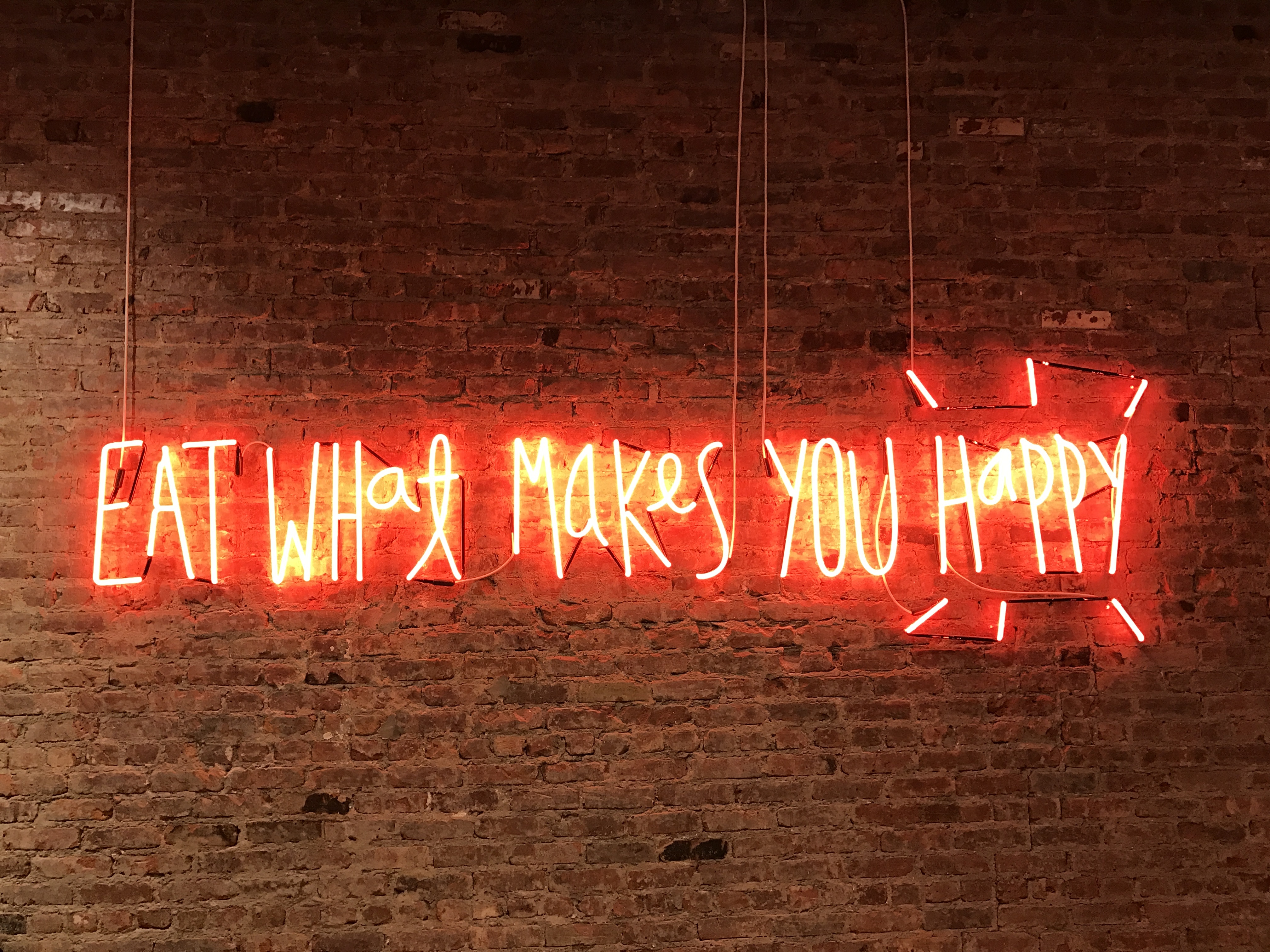 eat what makes you happy neon light signage
