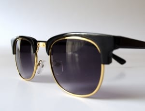 black and gold framed black lens clubmaster sunglasses thumbnail
