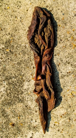brown wooden tiki mask thumbnail