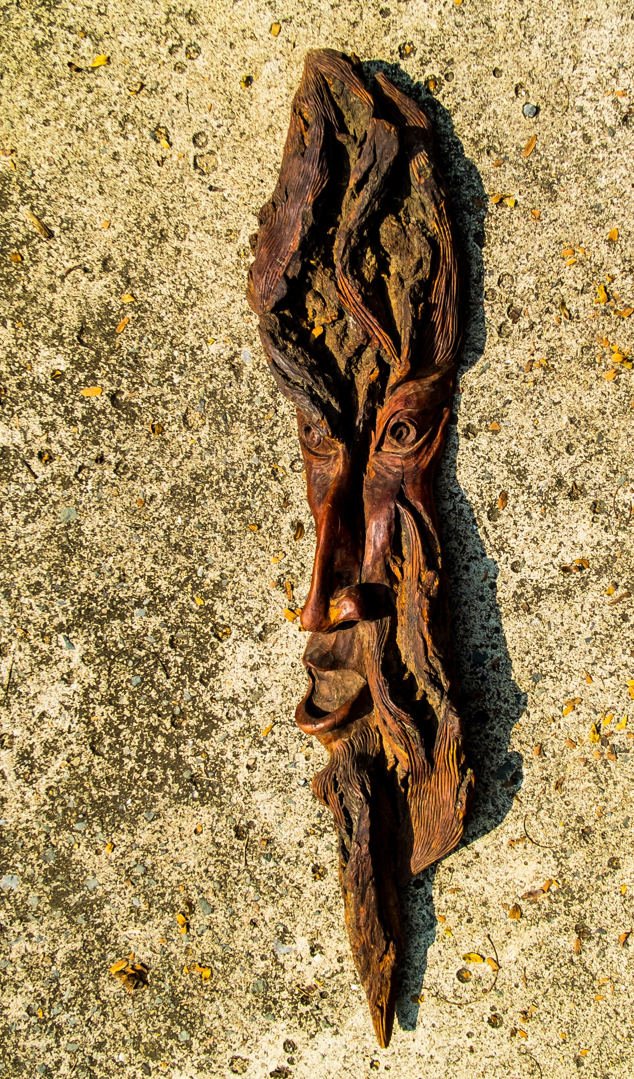 brown wooden tiki mask