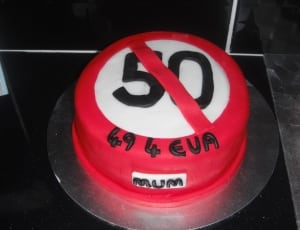 red and white cake on stainless steel plate thumbnail