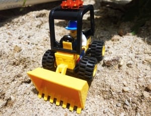 black and yellow front loader lego toy thumbnail