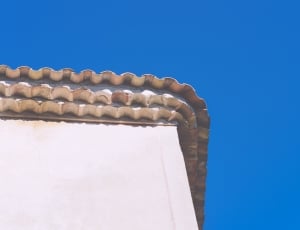 white roof under blue sky thumbnail