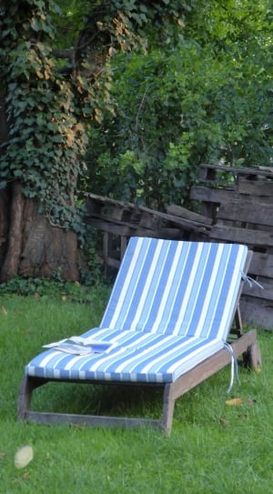 brown wooden framed blue white and teal striped foam padded lounger thumbnail
