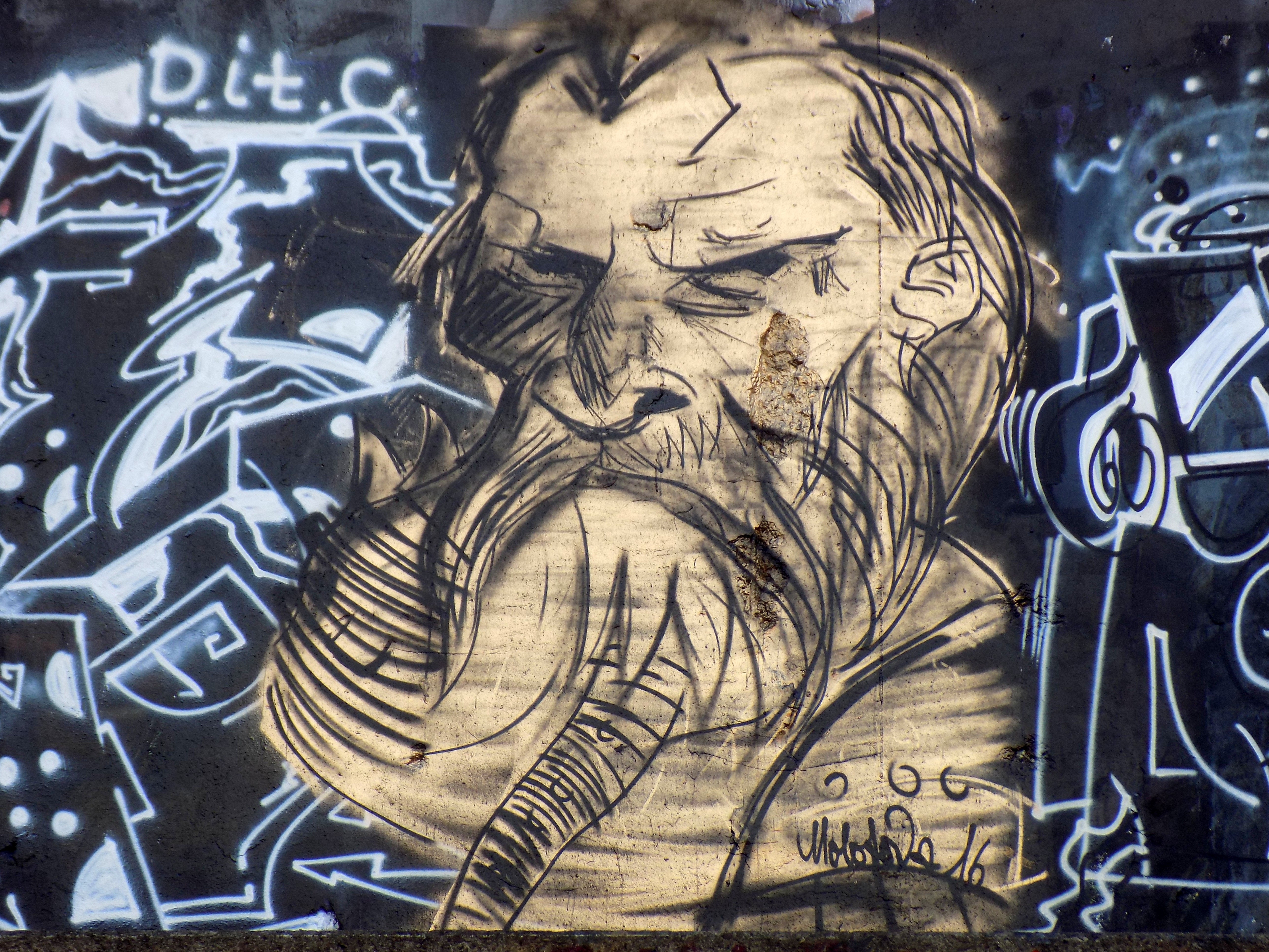 graffiti of man with long beard