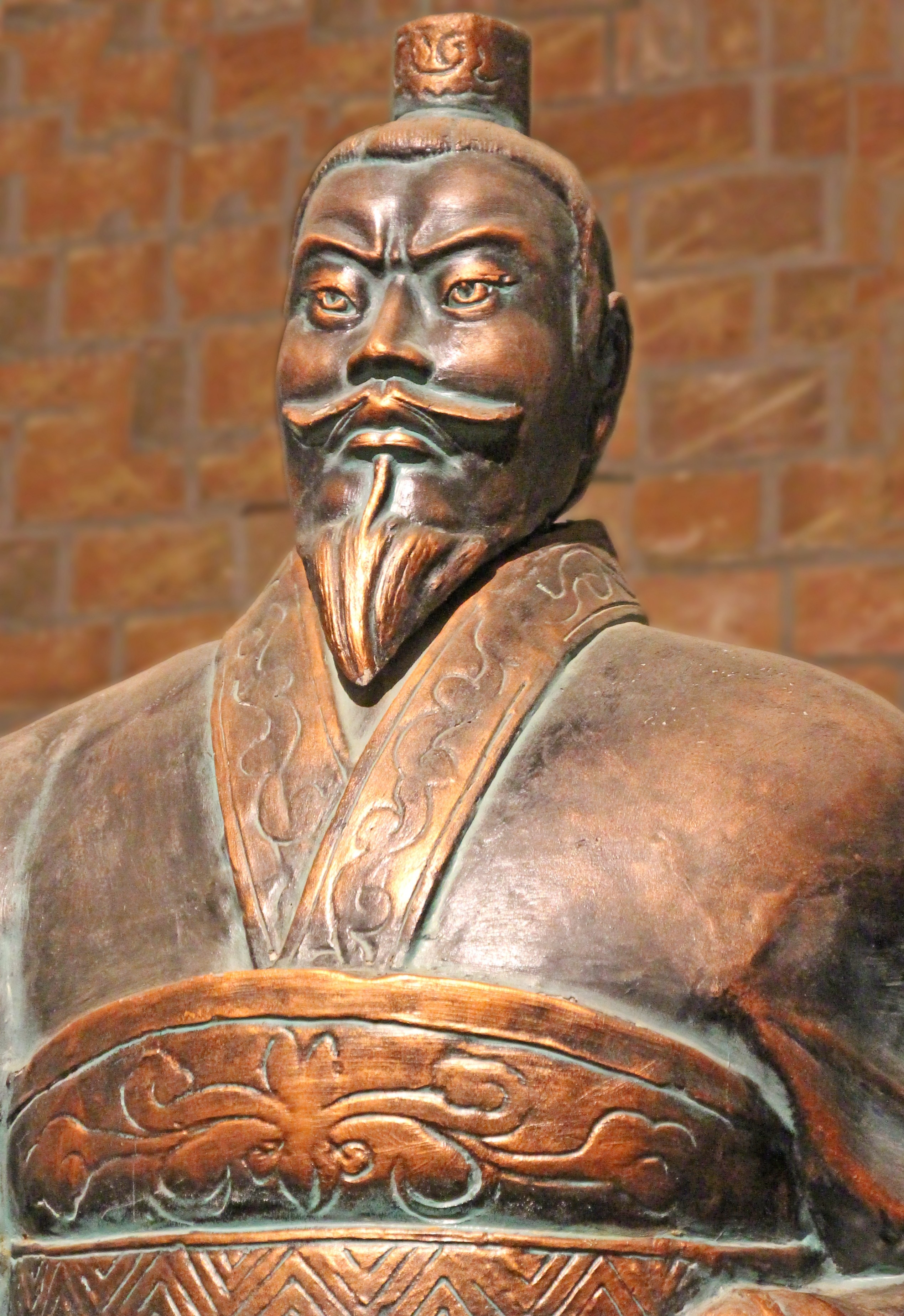 brown ceramic oriental figurine