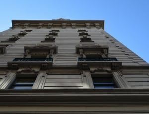 low angle building unded clear blue sky thumbnail