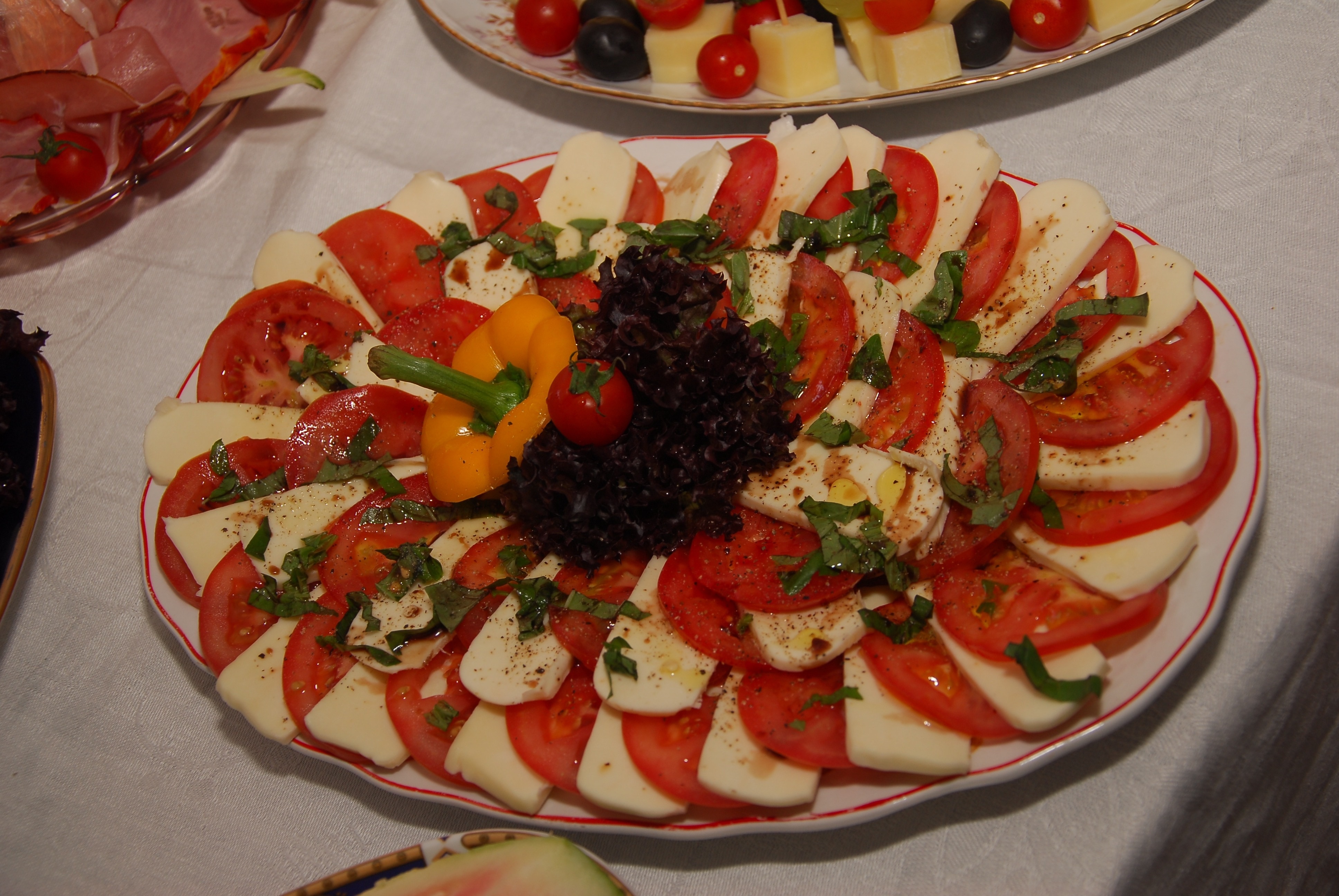 sliced tomato and white cheese platter