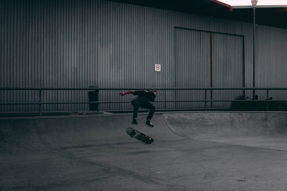 man in black shirt skateboardin preview