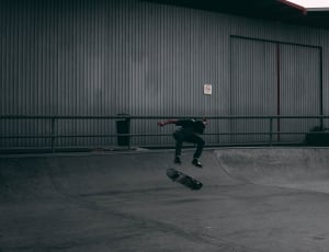man in black shirt skateboardin thumbnail