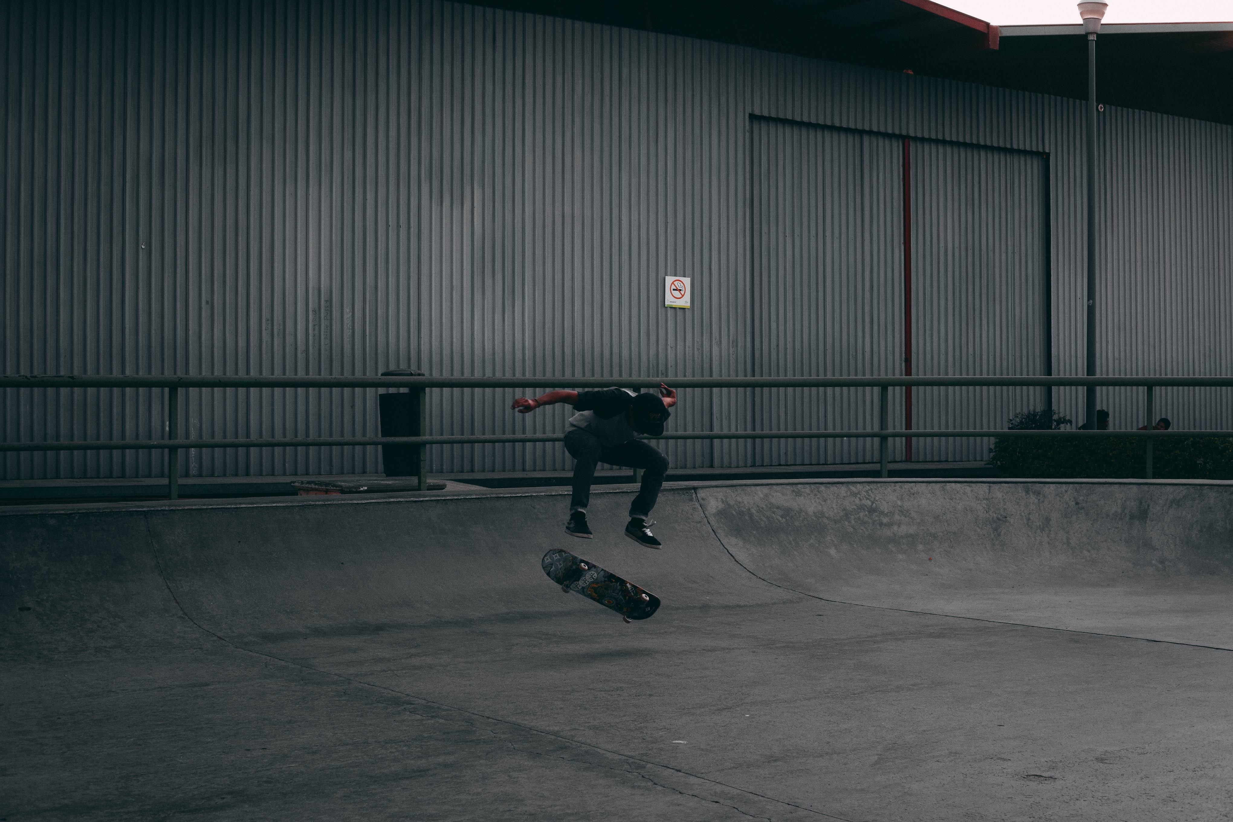 man in black shirt skateboardin