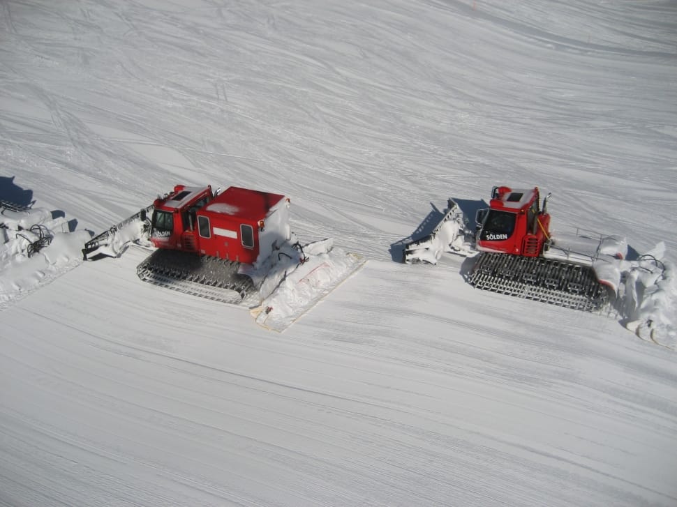 2 red snow trucks preview