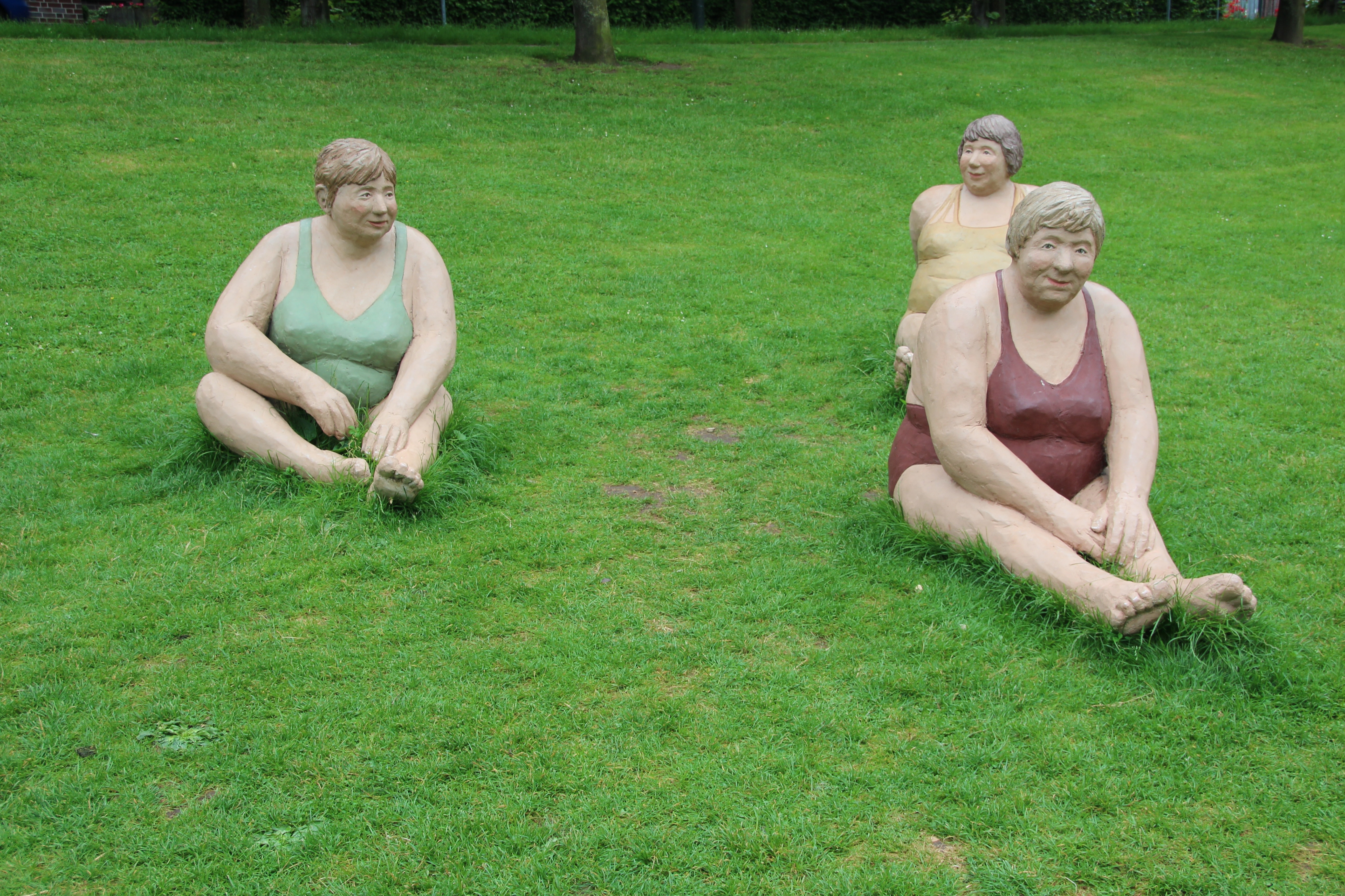 3 woman figurines