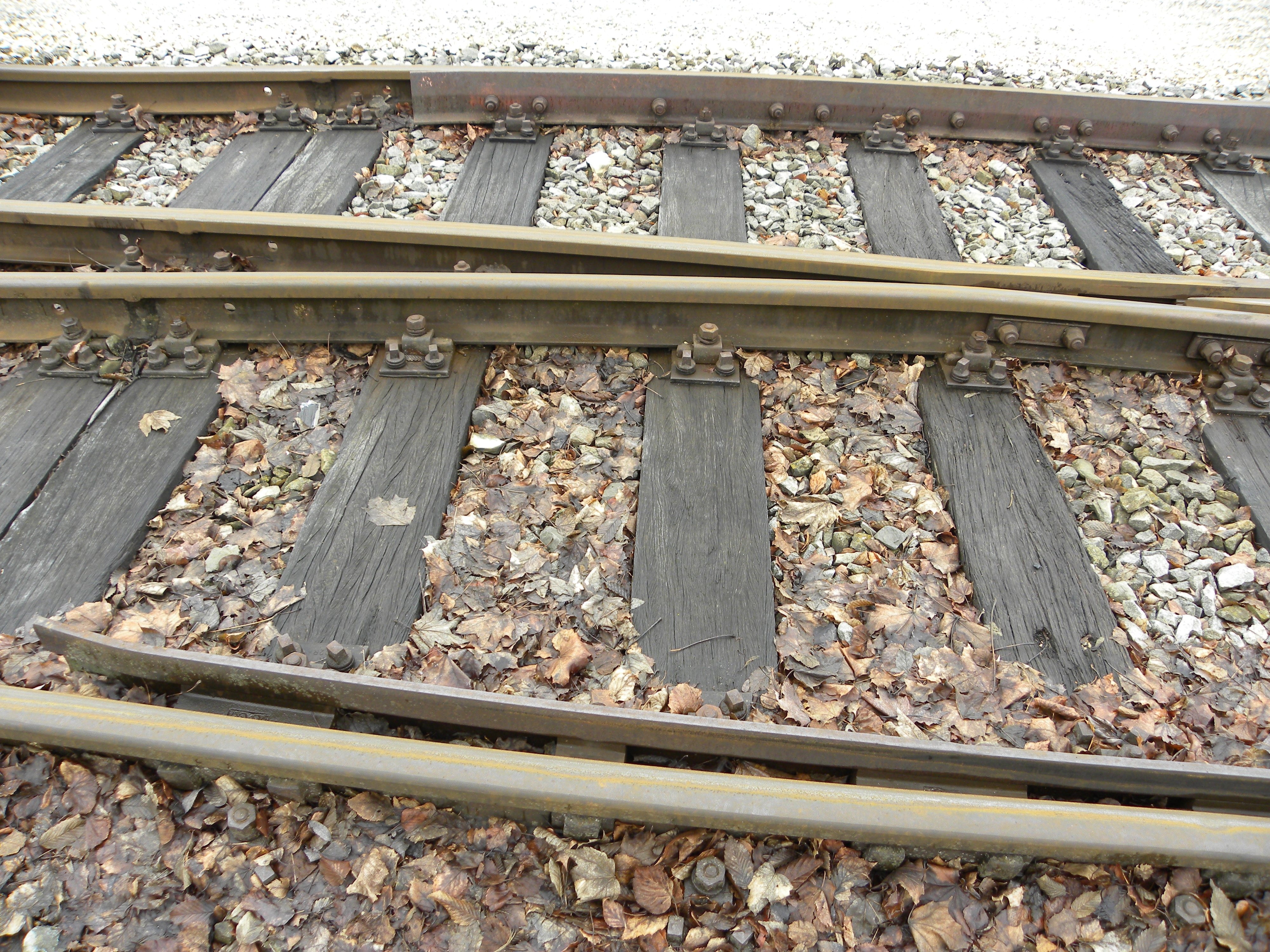 brown wooden train rail