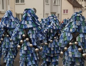 persons in blue and white costume thumbnail