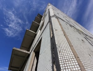 gray and white high rise building thumbnail