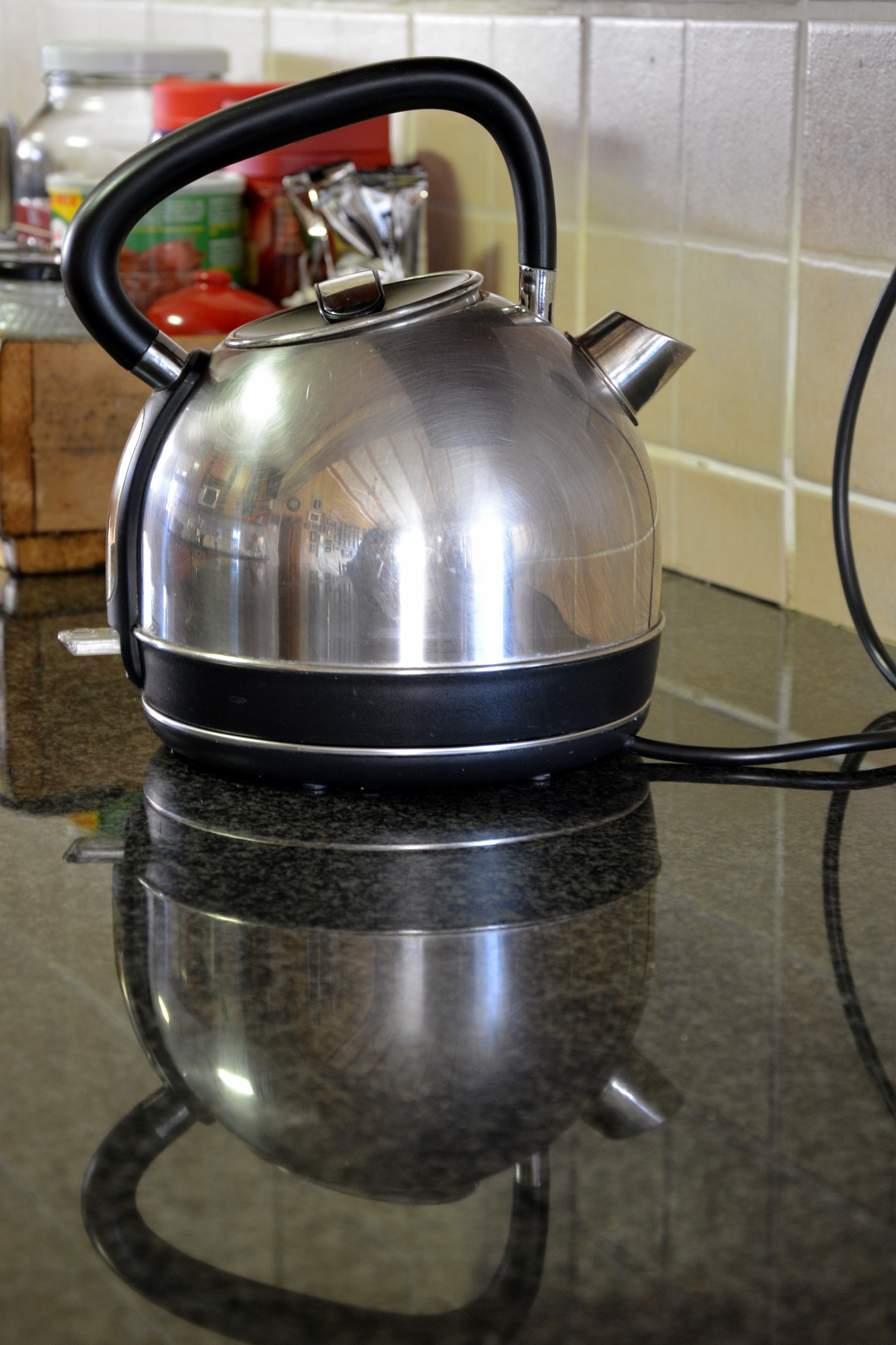 silver and black whistle kettle