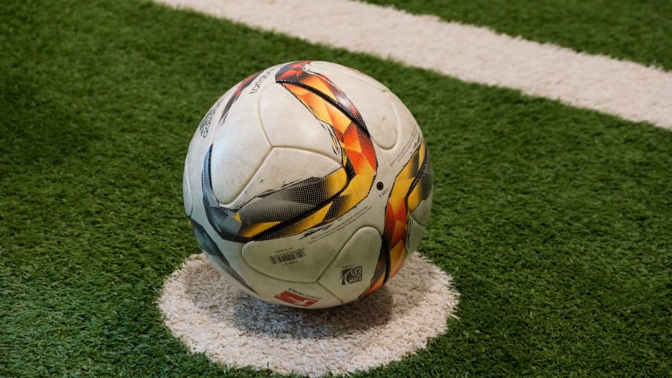 white yellow and red soccer ball preview